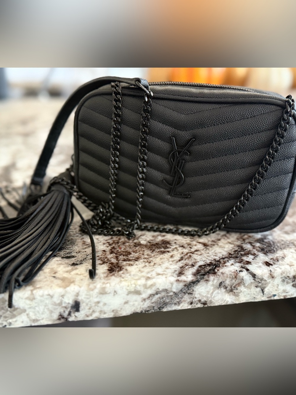 Black on black Yves Saint Laurent Quilted Leather Mini Chevron Bag w/Tassel